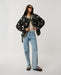 Rip Curl Bossa Nova Revo women’s reversible jacket in Military Green – full-length model view wearing the patterned side open