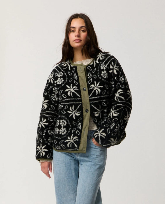 Rip Curl Bossa Nova Revo women’s reversible jacket in Military Green – front view of the black-and-cream patterned side