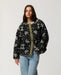 Rip Curl Bossa Nova Revo women’s reversible jacket in Military Green – front view of the black-and-cream patterned side