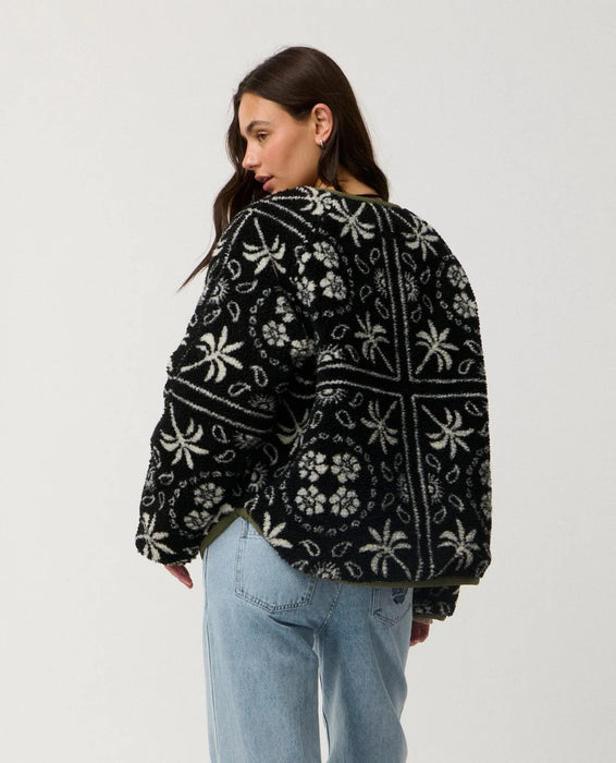 Rip Curl Bossa Nova Revo women’s reversible jacket in Military Green – back view of the black-and-cream patterned side