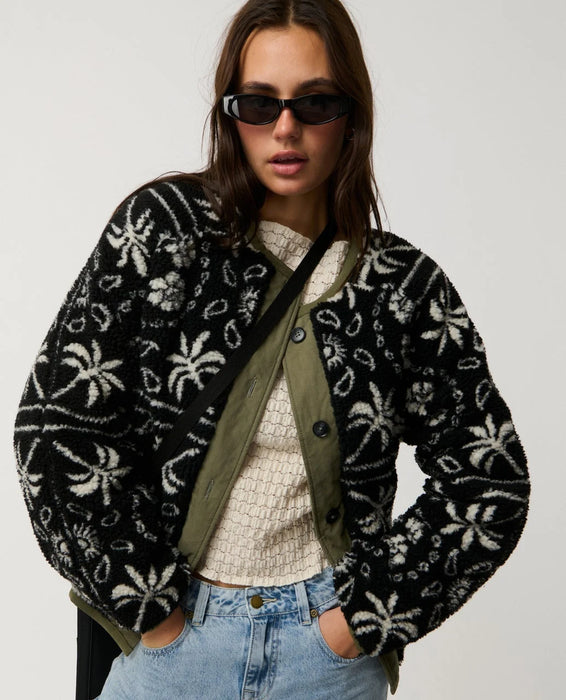 Rip Curl Bossa Nova Revo women’s reversible jacket in Military Green – close front view of the patterned side and green button placket