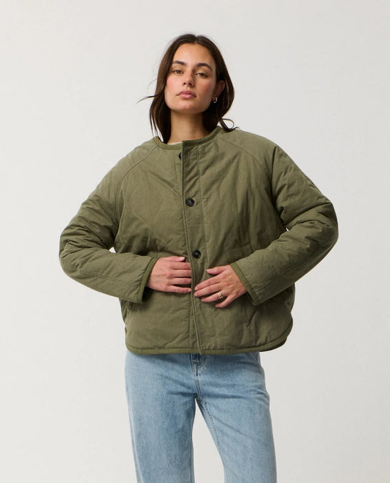 Rip Curl Bossa Nova Revo women’s reversible jacket in Military Green – front view of the green quilted side buttoned up