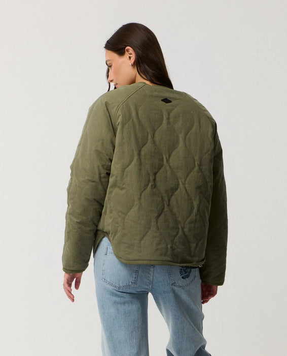 Rip Curl Bossa Nova Revo women’s reversible jacket in Military Green – back view of green quilting and upper-back badge