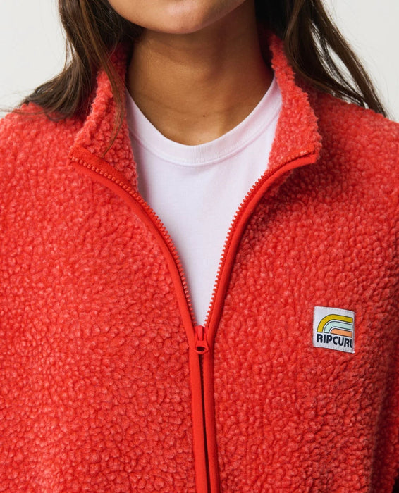 Close-up of the red Rip Curl fleece collar, front zip and chest logo