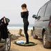Northcore Grass Waterproof Change Mat in Camo, in use at the beach