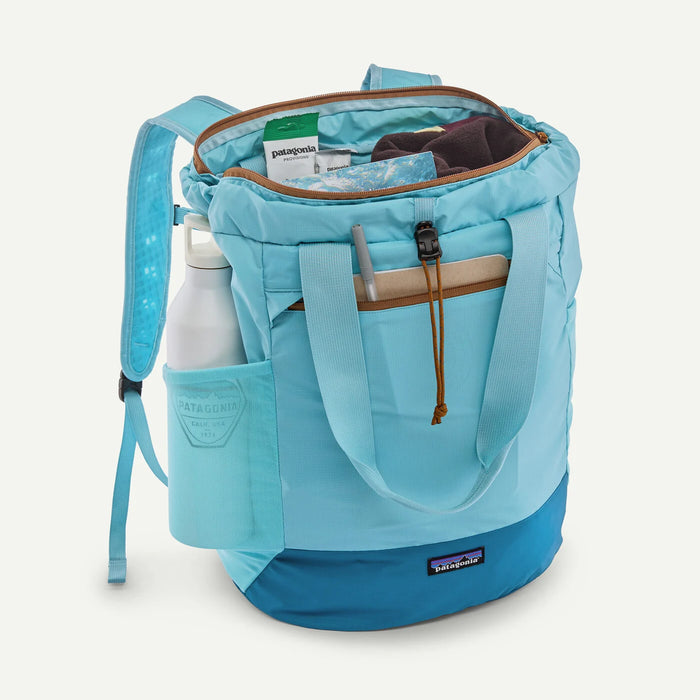 Patagonia Terravia Tote Pack 24L in Snowmelt Blue, open with water bottle