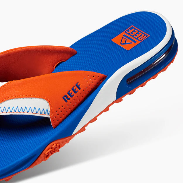 reef blue orange flip flops