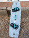 Used Duotone Jaime SLS 2027 142/43 cm kiteboard with Entity 360 bindings and Big Air handle, underside view