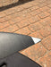Close-up of wingtip of used F-one Eagle 990 HM Carbon showing white protective tip and slight surface scuffs — disclosed cosmetic marks