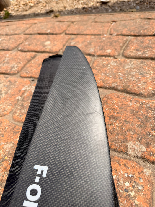 Close-up of leading edge of used F-one Eagle 990 HM Carbon showing surface scuffs — disclosed cosmetic marks, no structural damage