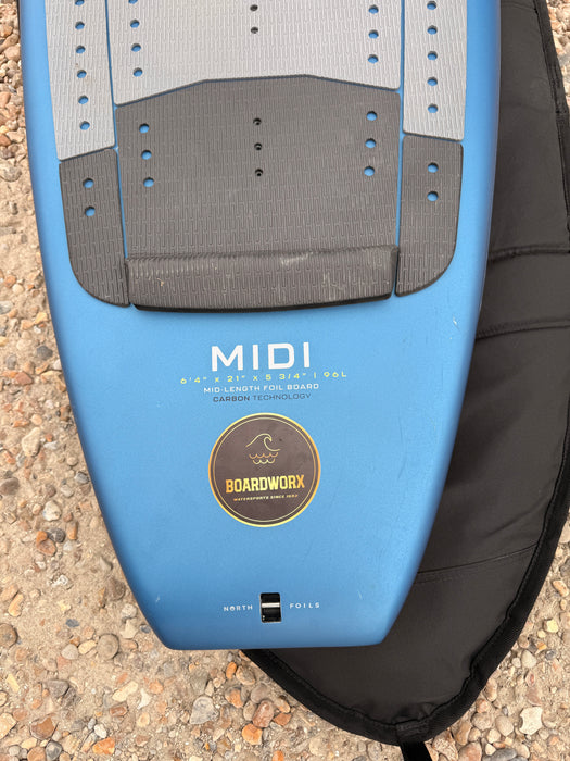 North Midi wing foil board deck detail with tail traction pad and MIDI logo