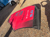 North Nova 5.0 wing foil wing packed into its carry bag, leaning upright against a railing