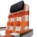 Close-up of Parkit Eclipse Sunkissed woven polyester webbing in warm orange and sun-washed cream tones