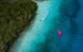 Duotone Jaime Concept Blue 2027 in use over a tropical lagoon