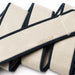 Arcade beige and navy webbing belt with navy trim, close-up texture view