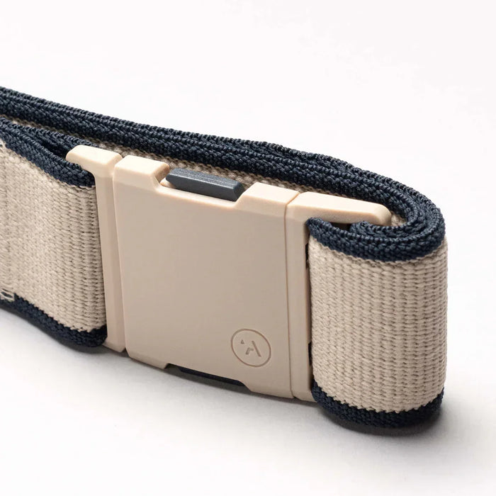 Arcade belt with beige buckle and navy edge detail, durable surf clothing accessory