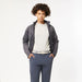 Arcade Carto oat navy belt on man with grey jacket and blue trousers
