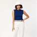 Arcade Carto Oat Navy woven belt with black buckle on white trousers, surf style clothing