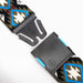 Arcade belt with geometric oat, turquoise and black pattern, plastic buckle close-up