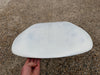 Nose of used Armstrong Wing SUP board 132L held up showing underside condition