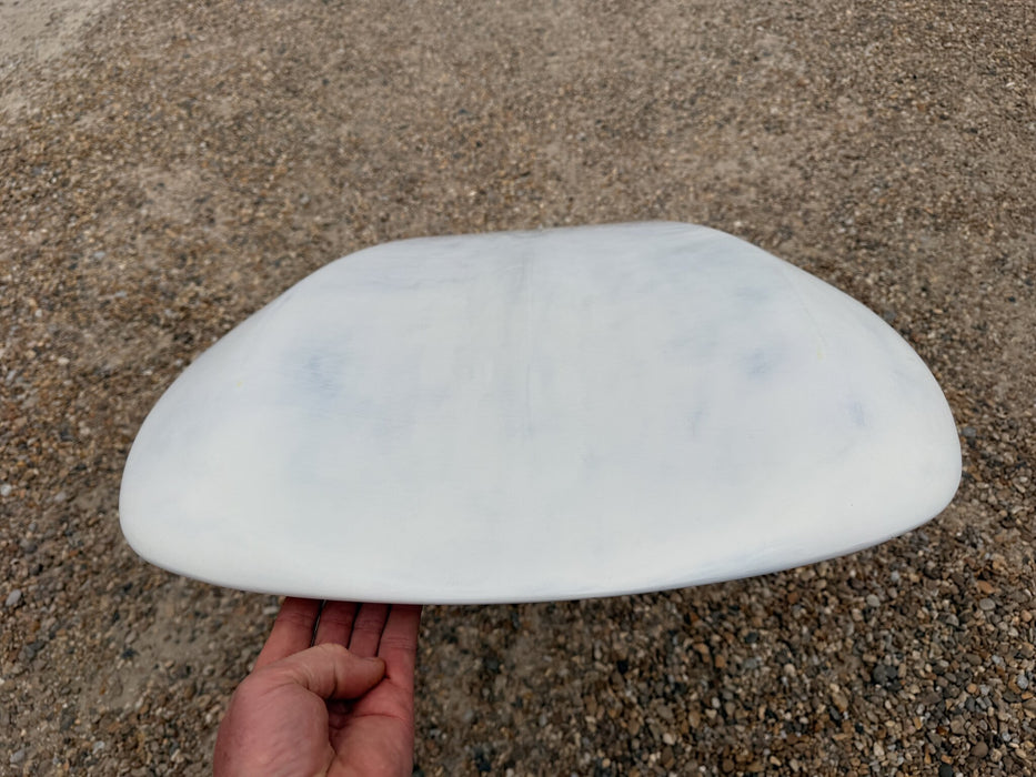 Nose of used Armstrong Wing SUP board 132L held up showing underside condition