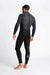Man wearing C-Skins Legend 5/4/3 GBS back zip wetsuit in black, rear view