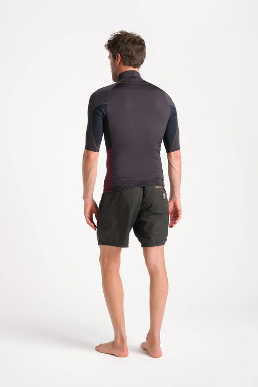 Man wearing C-Skins men's anthracite and bluestone short sleeve rash vest, back view