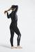 C-Skins Surflite 5/4mm women's winter wetsuit back zip, black, side view on model