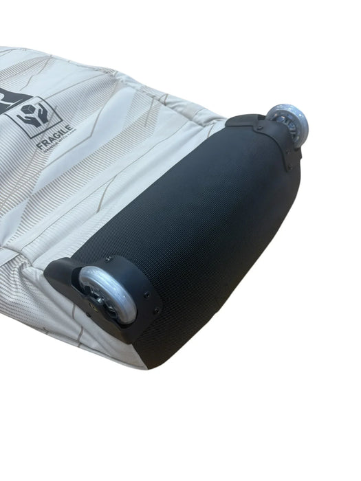 Duotone ivory kitesurf bag with wheels, reinforced base, and fragile label visible
