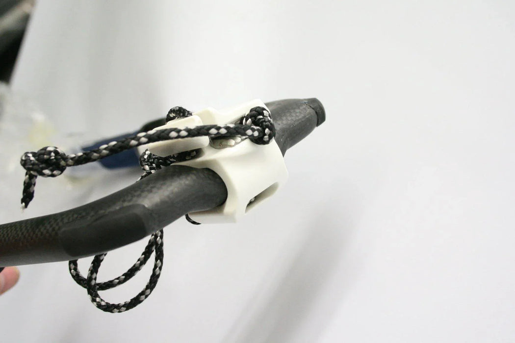 Duotone EPX Carbon Boom windsurfing boom with white rope cleat detail
