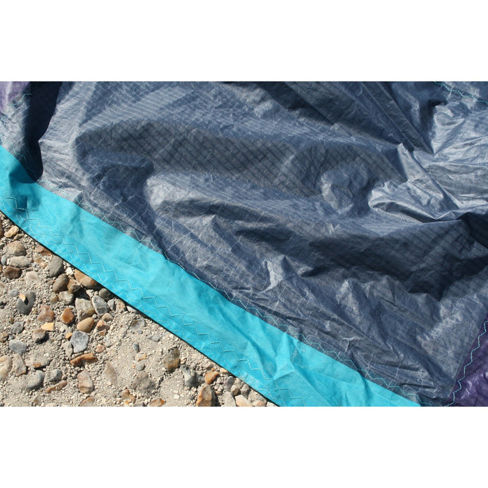 Close-up of light trailing-edge creasing on the used Evo SLS canopy