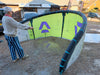 Duotone Evo SLS 10m kite held up outside the Board-Worx shop in Whitstable