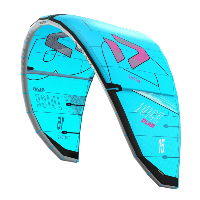 Rider setting up Duotone Juice D/LAB 2026 kite on beach for foil session