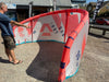 Red and white Duotone Neo 2024 10m kitesurfing kite displayed outdoors