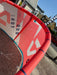 Duotone Neo 2024 kitesurfing kite, 10m size, red and white, used, displayed outdoors