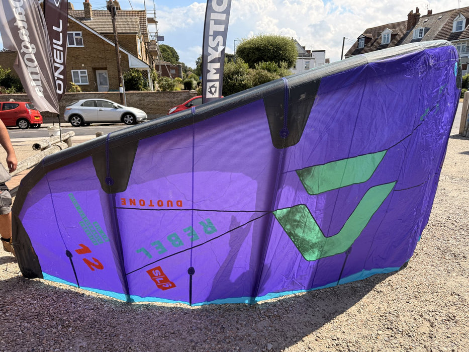Duotone Rebel SLS 12m 2026 kite front view, purple with green Duotone A logo