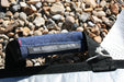 Duotone blue and black single twin tip board bag handle, max board size 143x45cm, on pebbles