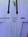 Close-up of specs label on used Duotone Skybrid 5'10" 100L 2025 showing 177cm x 57.78cm dimensions and Vacuum Sandwich Technology