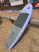 Tail section close-up of used Duotone Skybrid 100L 2025 wing foil board showing EVA deck pad detail, Duotone logo and footstrap inserts