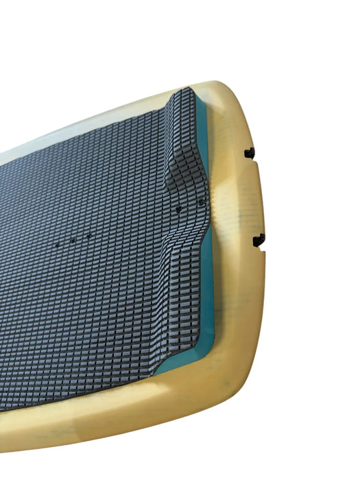 Duotone kite foil board with textured black deck, yellow and blue edge detail