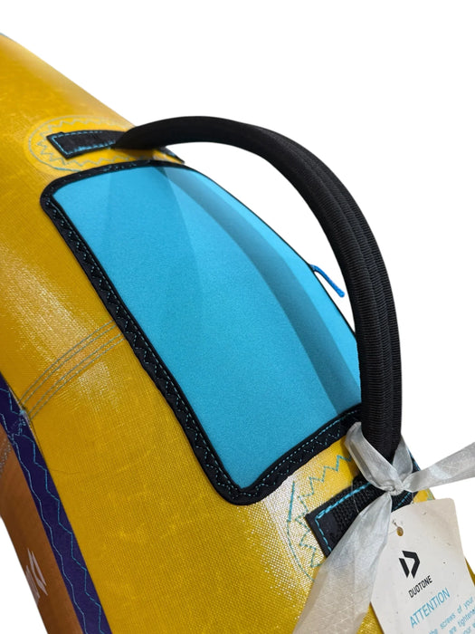 Duotone wing foil handle and strut in maroon, sand, and blue, showing robust stitching.