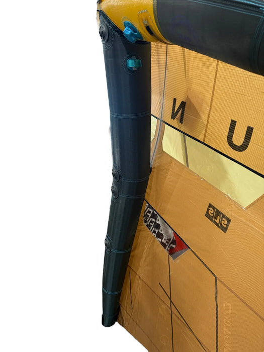 Duotone SLS wing foil in maroon and sand colours with visible clear panel and inflation valves.