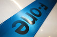 F-One Alu Foil Mast close-up in metallic blue with black logo lettering