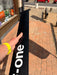 Leading edge profile of used F-one Carbon Mast 85 held up showing foil section and clean carbon condition