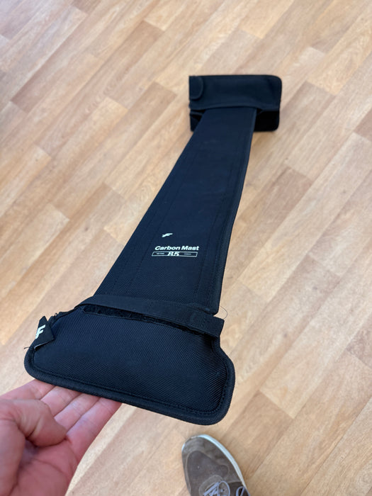Used F-one Carbon Mast 85 in original protective cover bag showing Carbon Mast 85 label and padded fuselage connection cover
