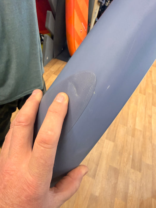 Slight sealed dent in the rail, under the rail tape, on the used Sky Free 5'3