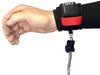 Black wingfoil wrist leash with red strap on wrist, metal swivel and braided cord