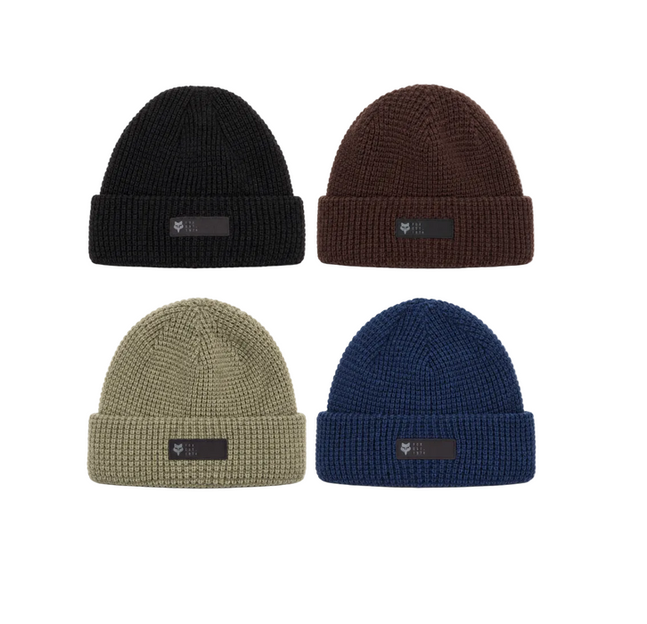 Fox Four knit beanie hats arranged in a 2x2 grid on a white background, shown in black, brown, olive green, and navy blue. Each beanie has a folded cuff with a small dark rectangular logo patch.