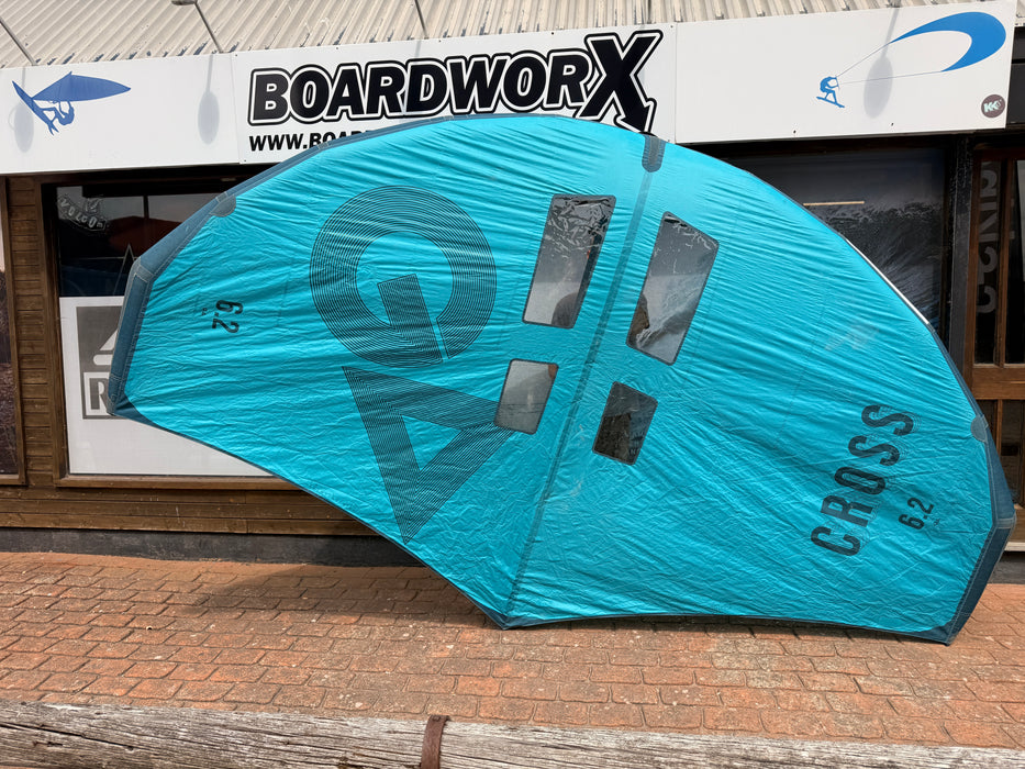 Used GA Wings Cross 6.2 2023 wingfoil wing — full canopy view outside Boardworx, teal and slate blue colourway