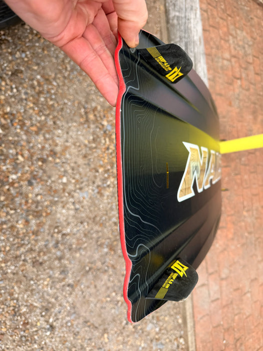 Naish Monarch kitesurfing kite board, black with yellow fins and red edge detail